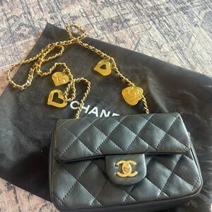 CHANEL Black Lambskin Quilted Heart Charms
Rectangular Mini Classic Flap